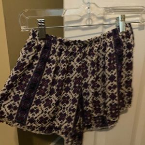 Brandy Melville purple and white floral shorts